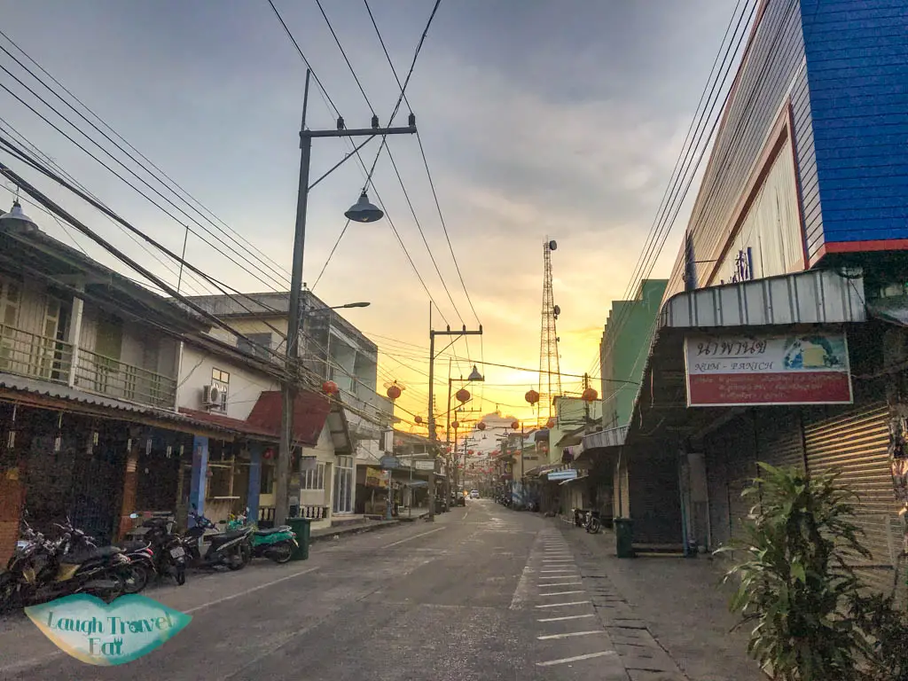 walking to pier sunrise koh phangan thailand - laugh travel eat