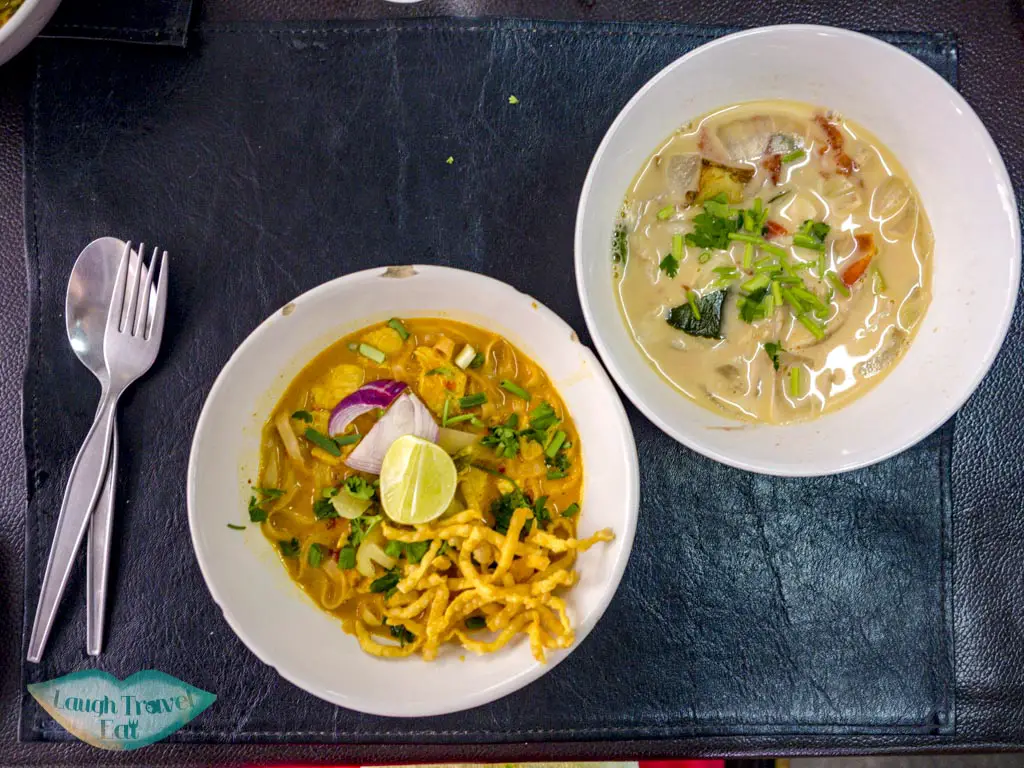 khao soi and coconut soup backstreet academy asia scenic cooking class chiang mai thailand - laugh travel eat