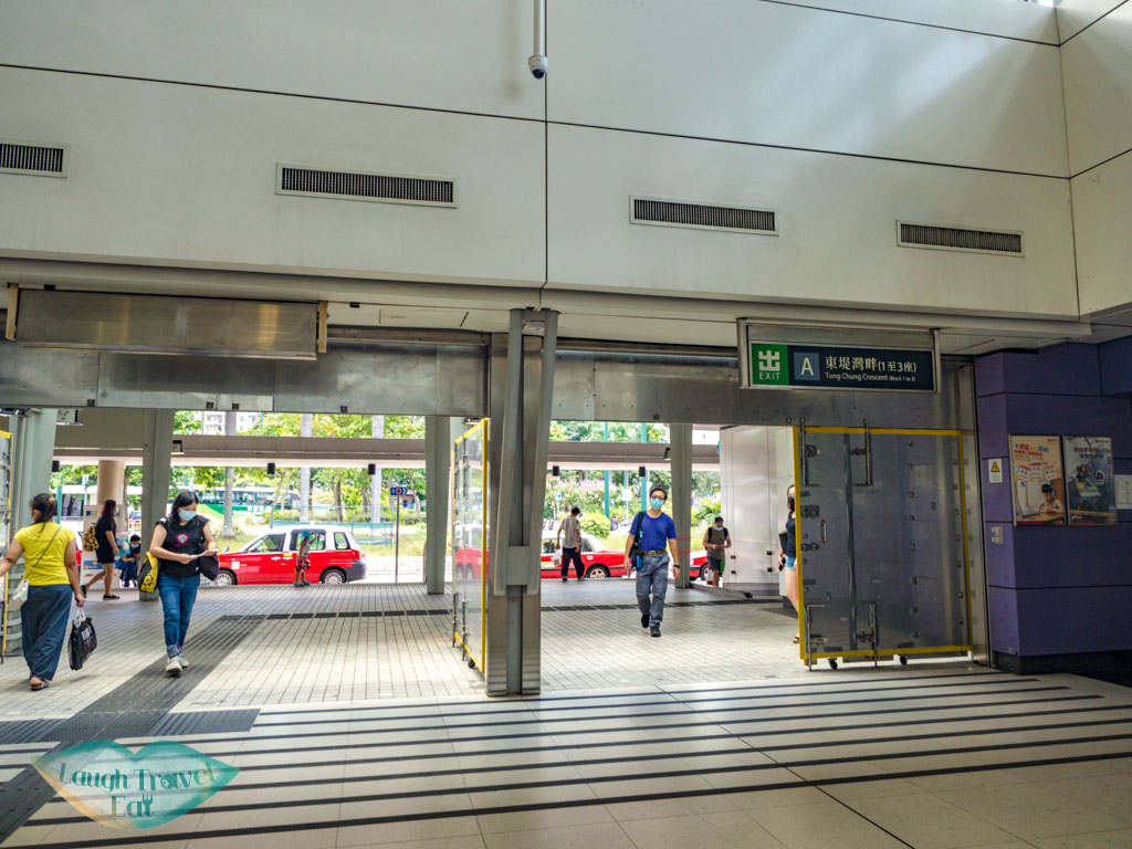 tung chung mtr exit a lantau island hong kong - laugh travel eat