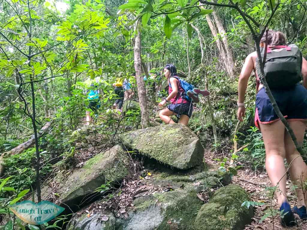 getting out from dragon waterfall stream tai shing stream hong kong - laugh travel eat