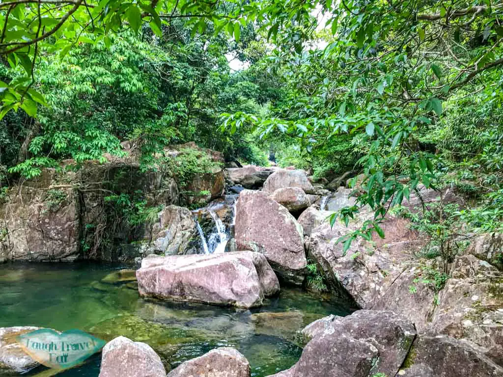 waterfalls in tai shing stream hong kong - laugh travel eat