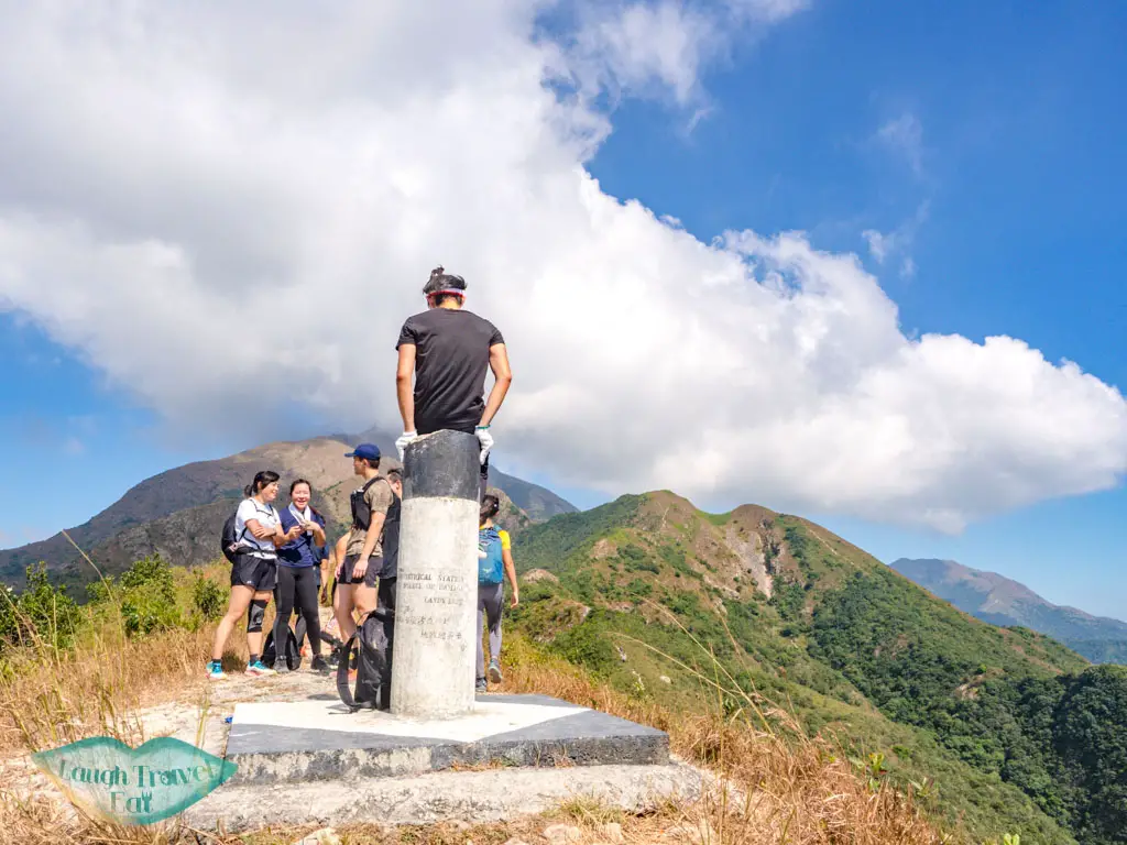 first peak with pillar mid kau nga trail start stop lantau island hong kong - laugh travel eat