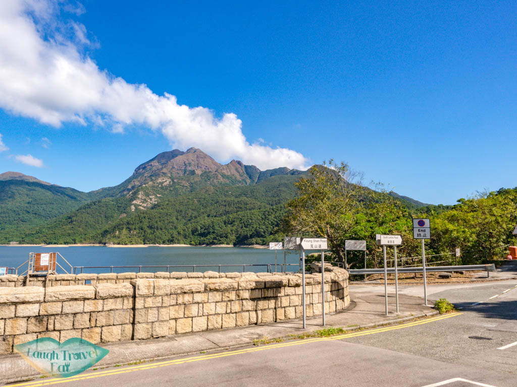 shek pik reservoir shek pik police stand bus stop lantau island hong kong - laugh travel eat