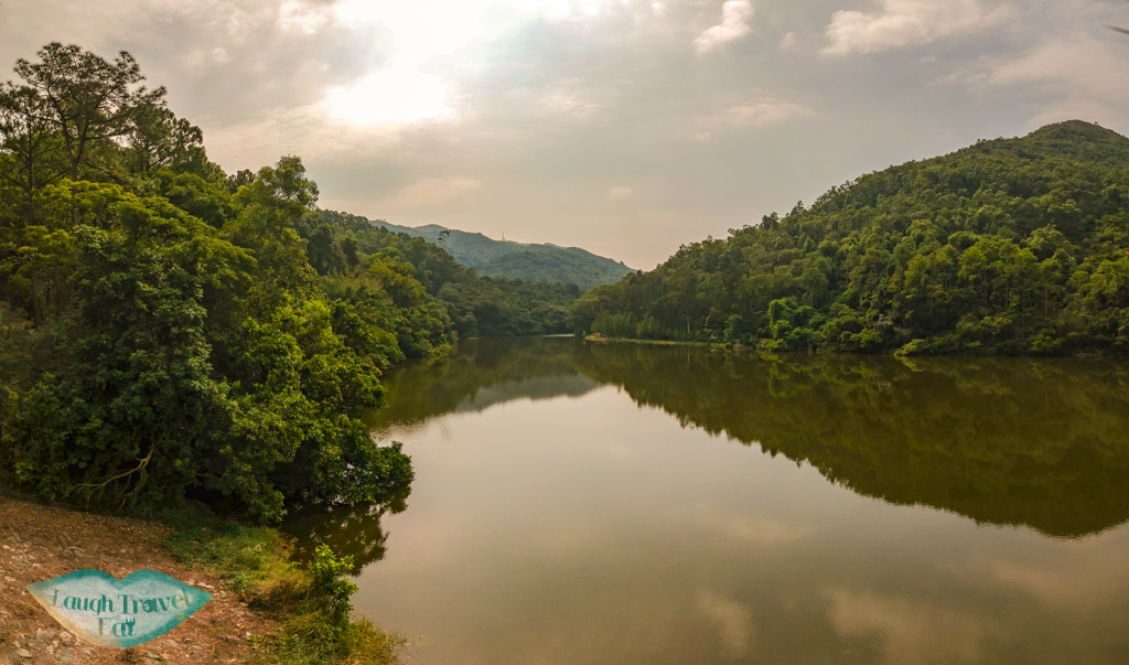 drone view of dam at Lau Shui Heung Reservoir from main road new territories hong kong - laugh travel eat