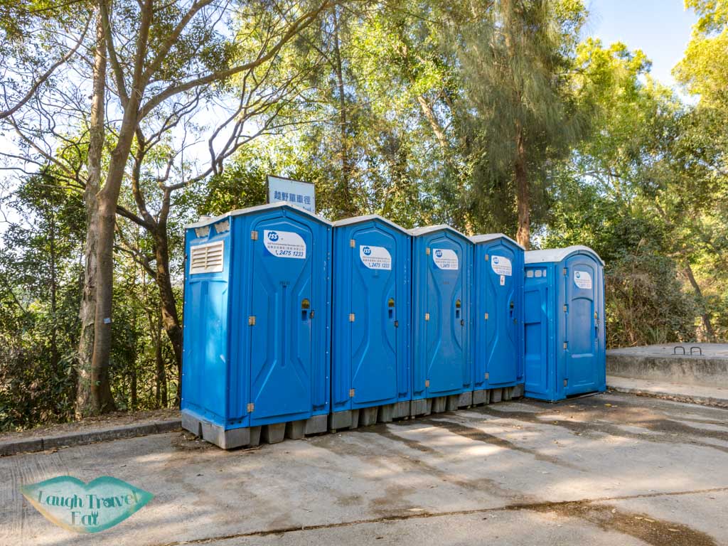 portable bathrooms at start of sweet gum woods tai tong yuen long hong kong - laugh travel eat