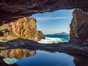 under the arch crab cave cape d'aguilar south hong kong - laugh travel eat