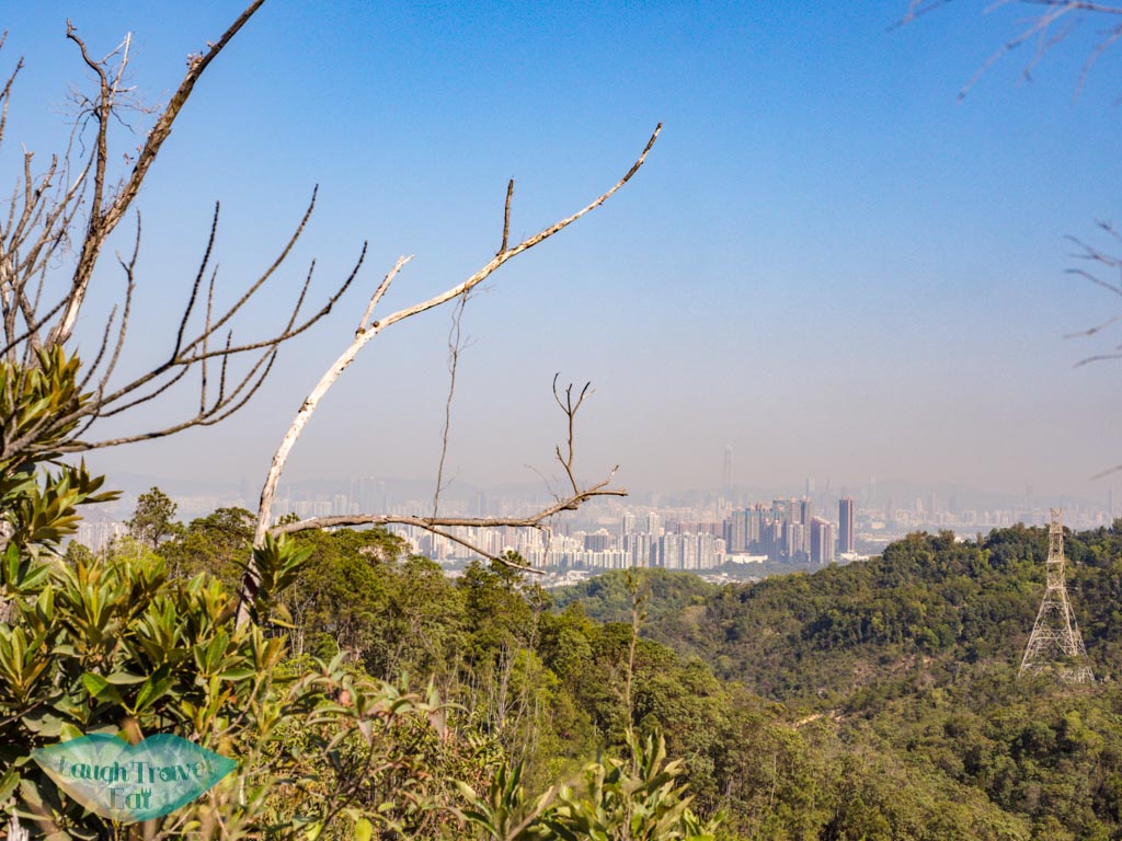 view of shenzhen on the way to reservoir island viewpoint tai lam country park yuen long hong kong - laugh travel eat