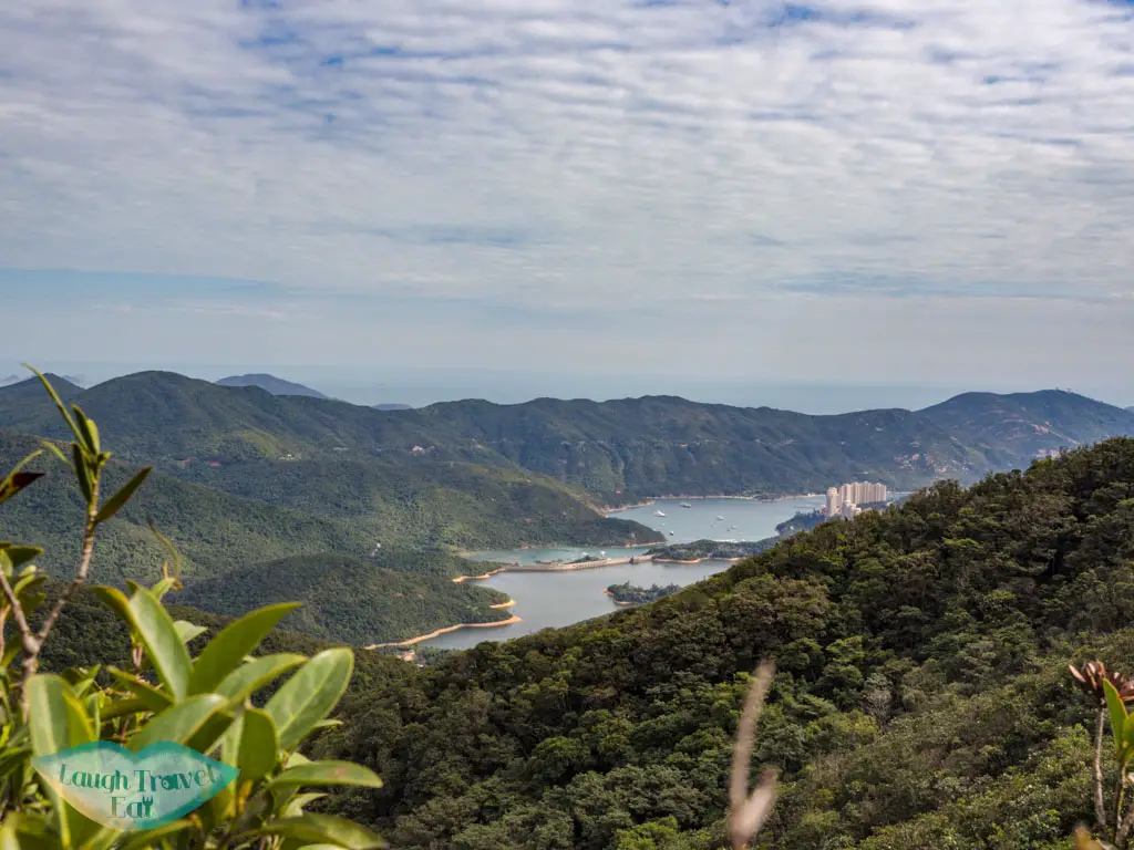 view of tai tam reservoir wilson trail violet hill hong kong island hong kong - laugh travel eat