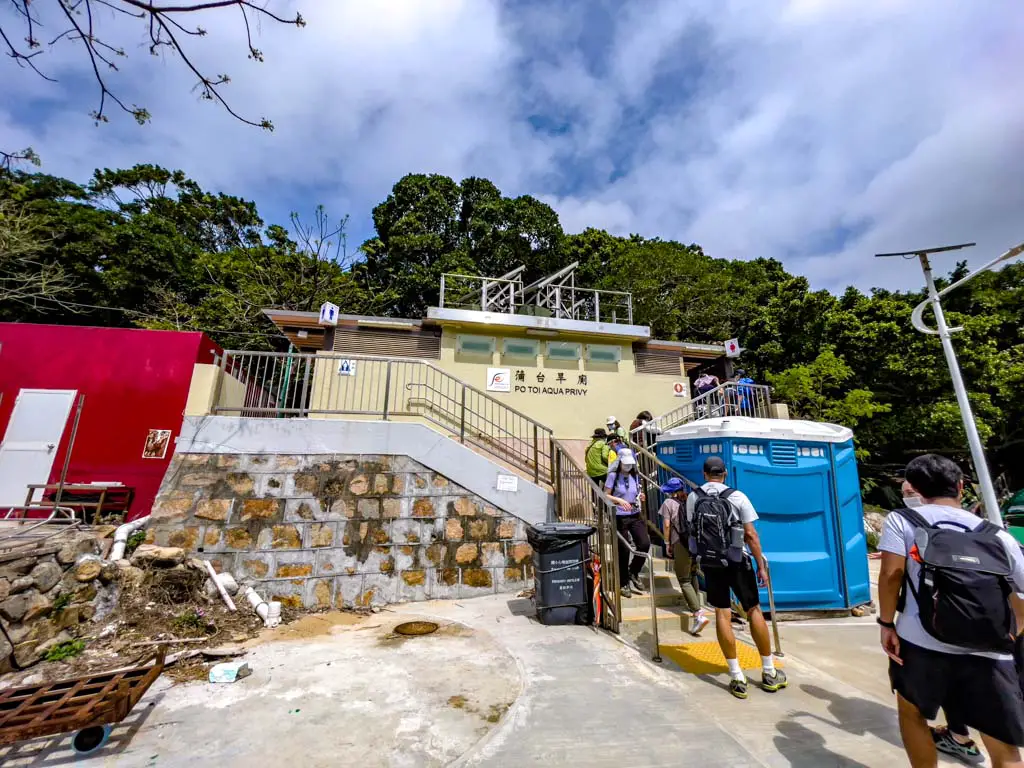 public toilet at tai wan bay po toi island hong kong - laugh travel eat