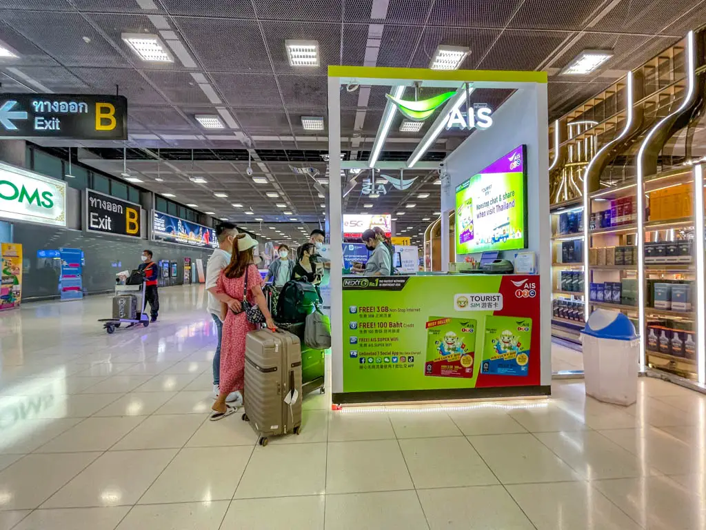 AIS counter by baggage claim 12 Bangkok airport April 2022 Thailand - laugh travel eat
