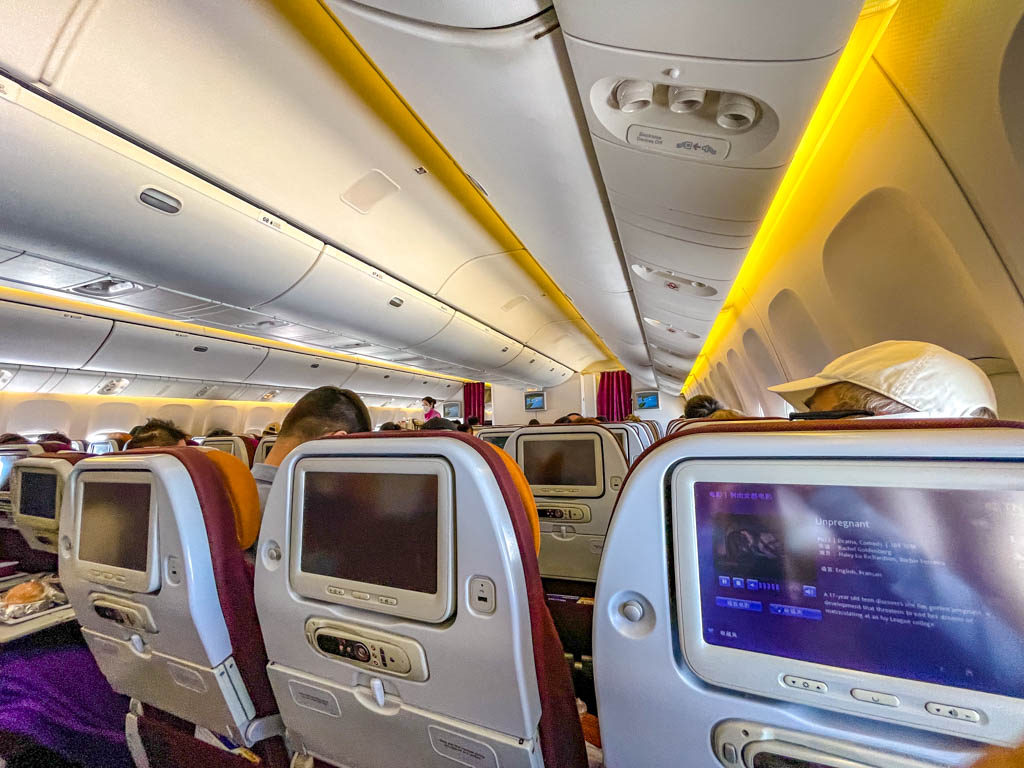 inside aircraft at Thai Airways flight to Bangkok April 2022 - laugh travel eat