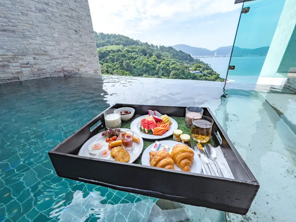 floating breakfast pool villa wyndham grand phuket kalim bay phuket thailand - laugh travel eat