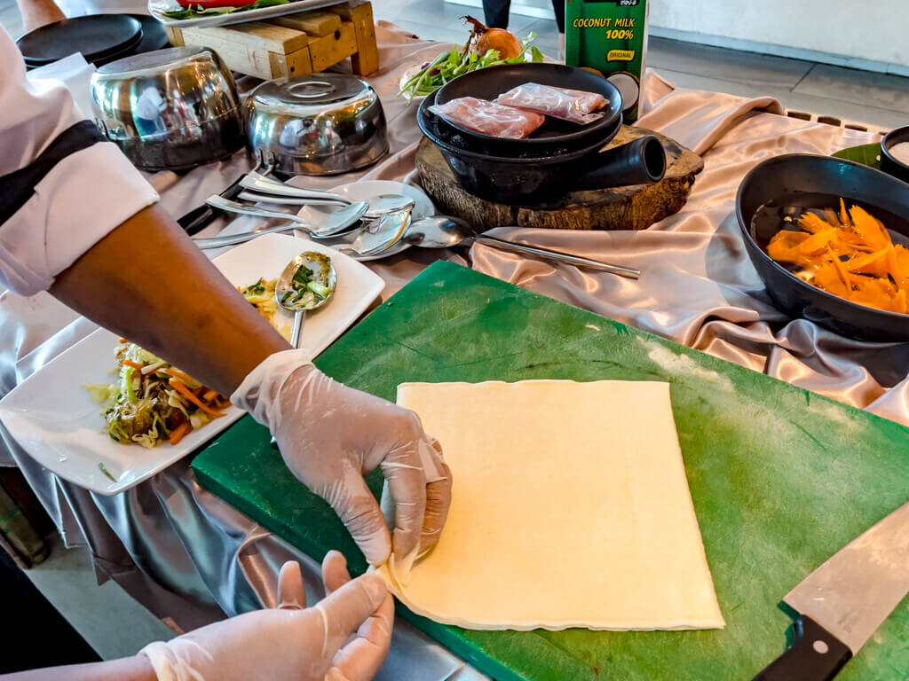 spring roll first course latitude 98 wyndham grand phuket kalim bay phuket thailand - laugh travel eat