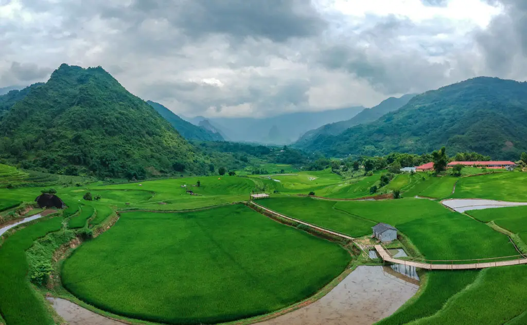 bamboo bridge drone shot trekking cycling tripba be national park vietnam