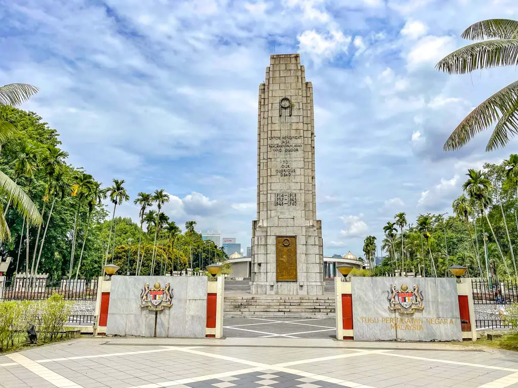 national monument at perdana botanical garden kuala lumpur Malaysia - laugh travel eat