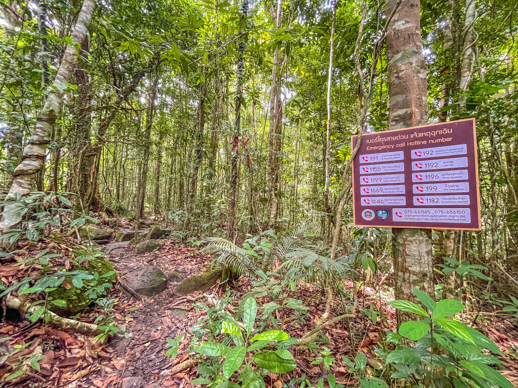 big sign close to peak Dragon Crest Mountain Khao Ngon Nak Krabi thailand - laugh travel eat
