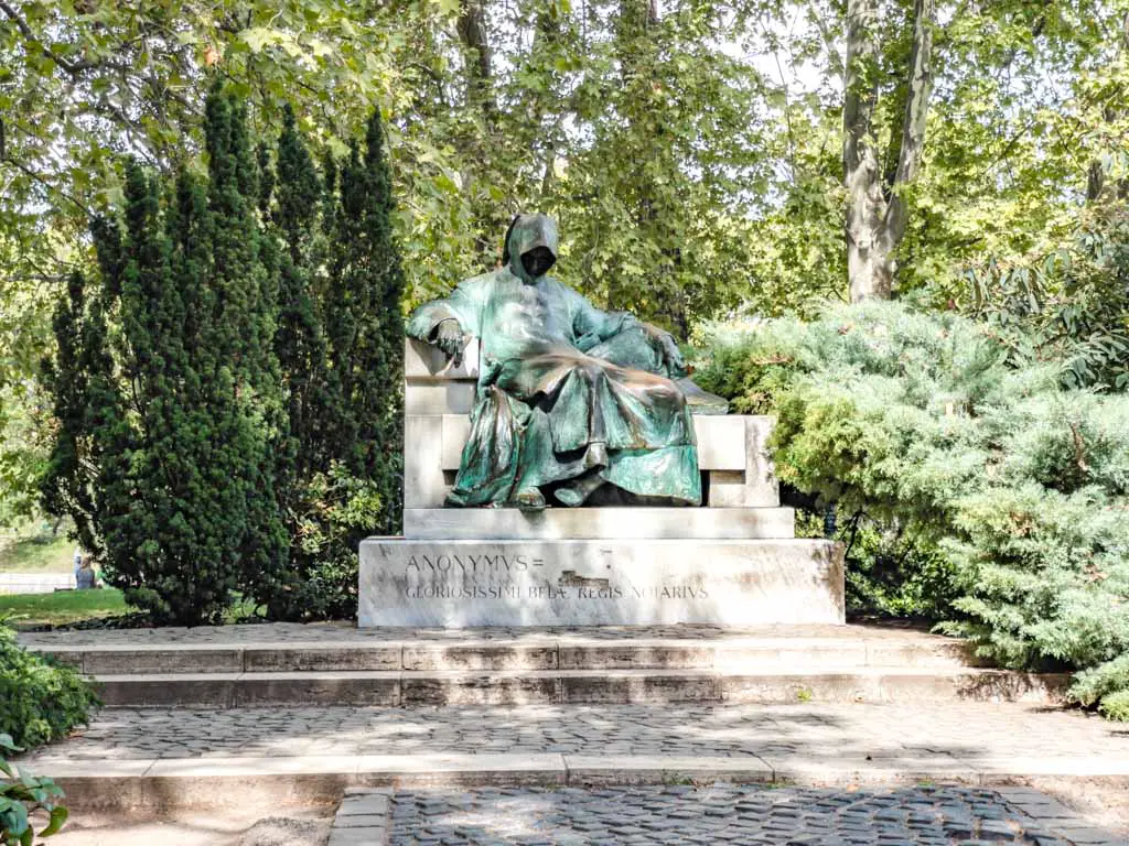 creepy statue Vajdahunyad Castle budapest hungary - laugh travel eat