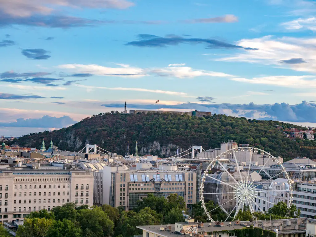 gellert hill and budapest eye budapest hungary - laugh travel eat