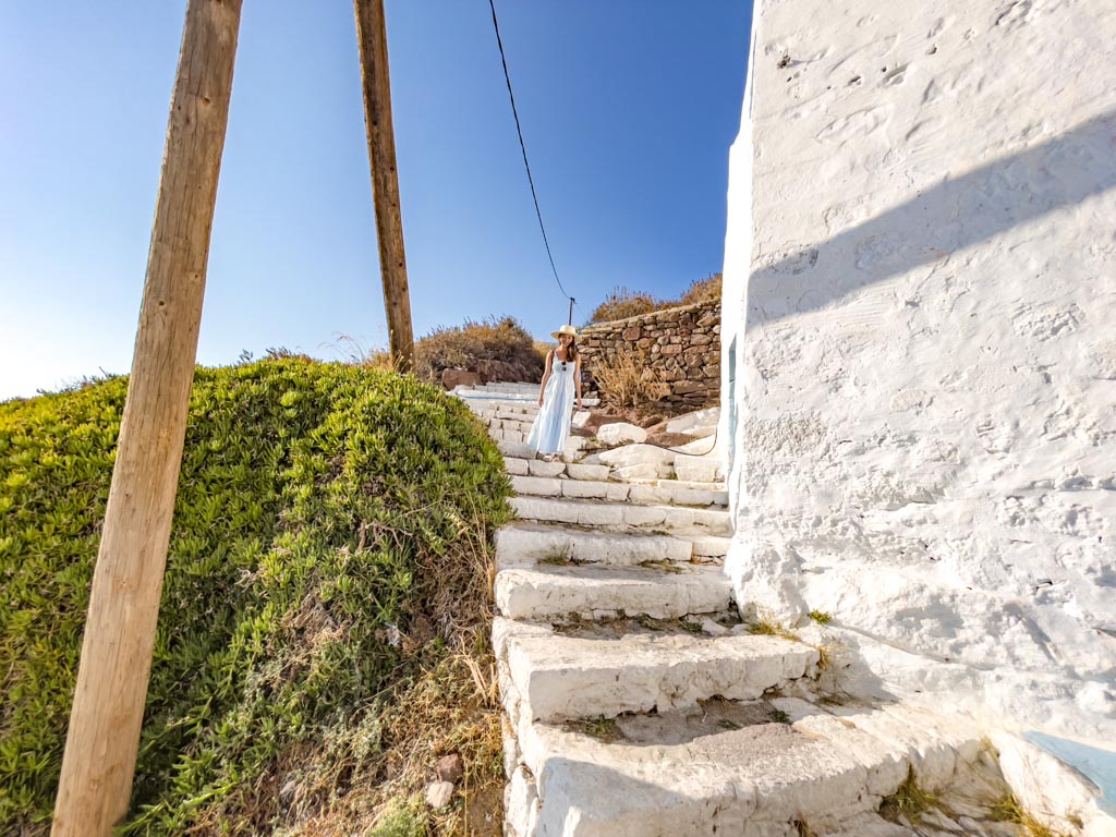 hiking up to plaka castle plaka milos greece - laugh travel eat