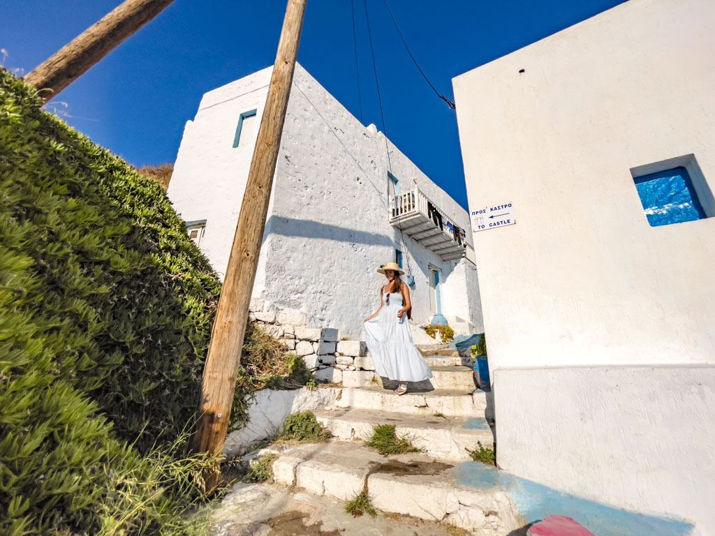 hiking up to plaka castle plaka milos greece - laugh travel eat