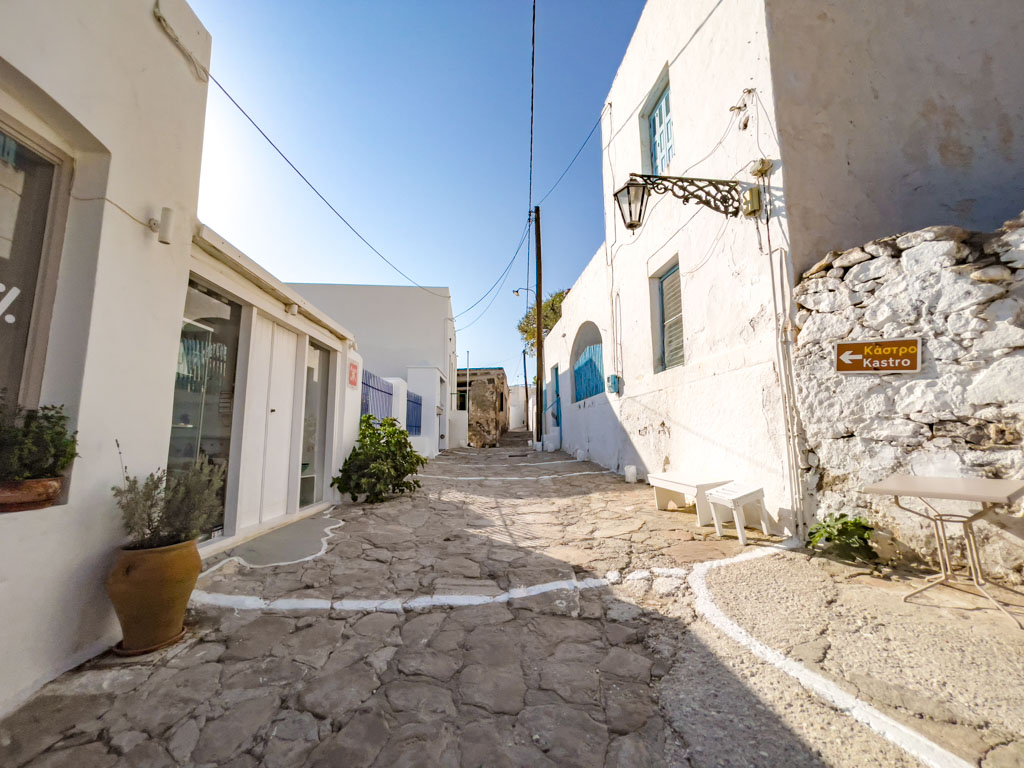 hiking up to plaka castle plaka milos greece - laugh travel eat