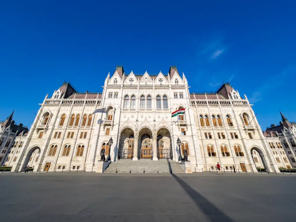 hungarian parliament front entrance budapest hungary - laugh travel eat