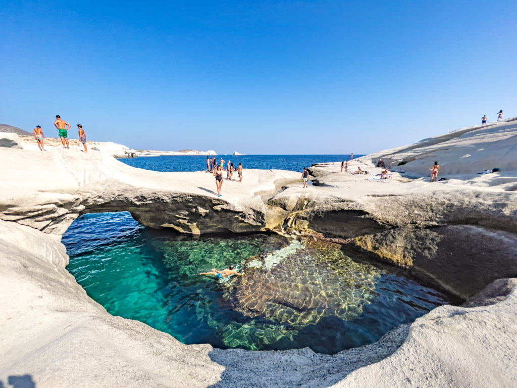 iconic archsarakiniko beach milos greece - laugh travel eat
