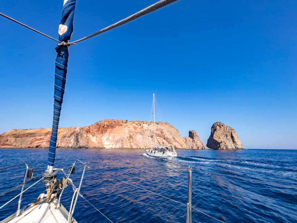 red rocks milos greece - laugh travel eat