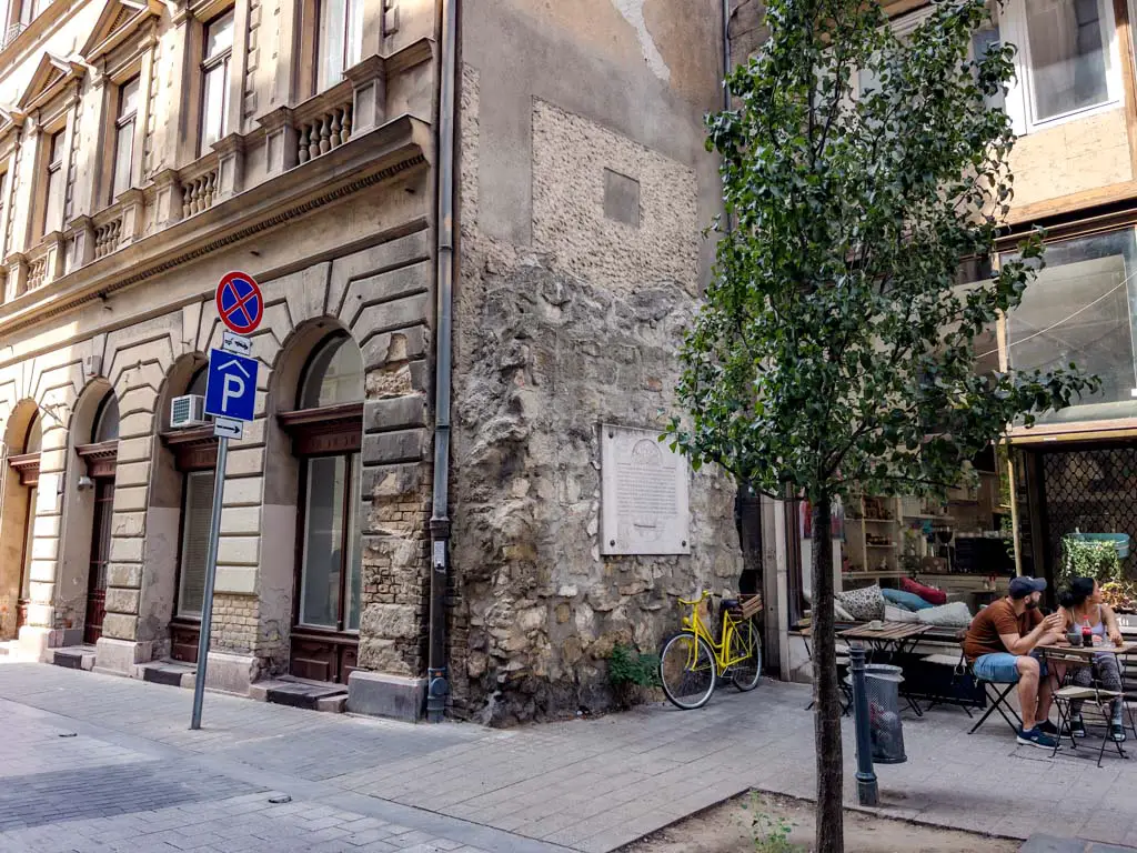 remnant of old city wall pest budapest hungary - laugh travel eat