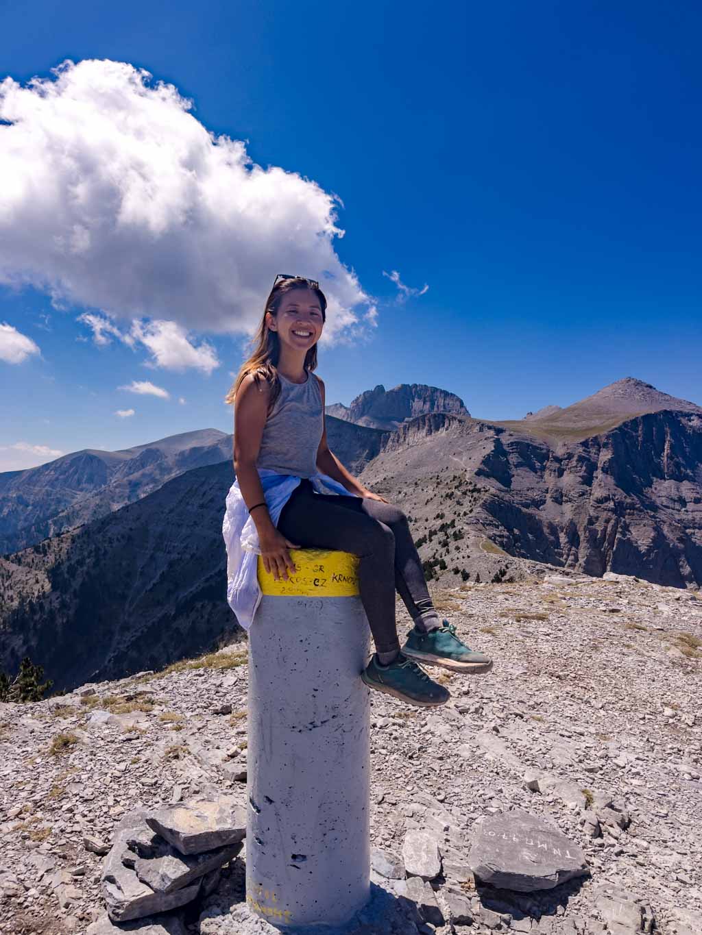 me on pillar at skourta mount olympus litochoro greece - laugh travel eat