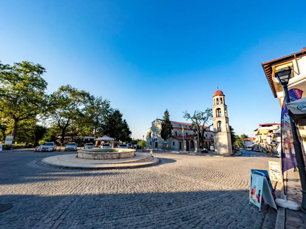 town square litochoro greece - laugh travel eat