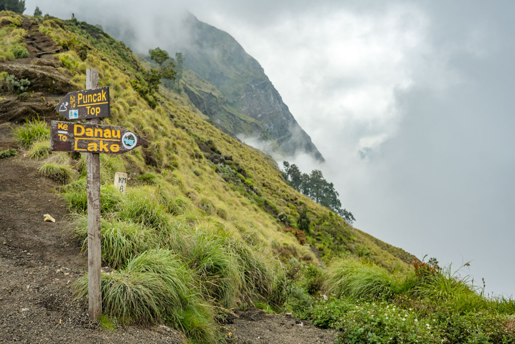 summit and lake signs campsite sembalun route mount rinjani trek lombok indonesia - laugh travel eat
