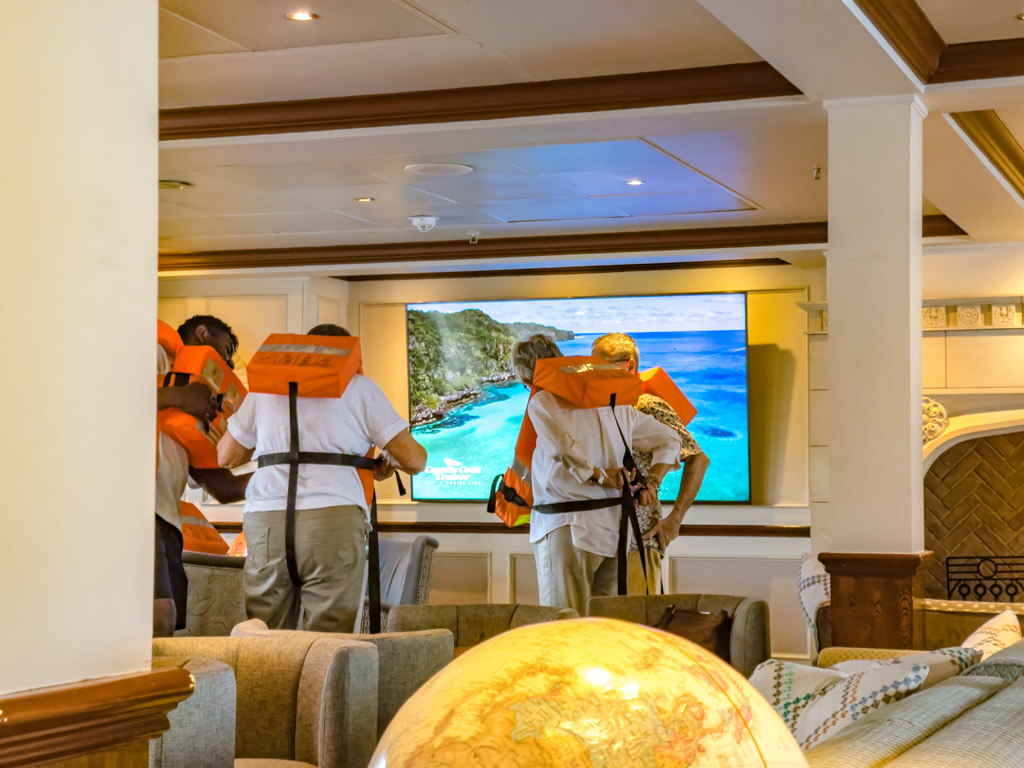 safety briefing Calendonian Sky Captain Cook Cruise Fiji - laugh travel eat