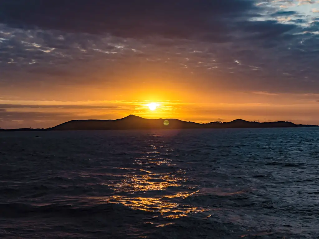 sunset Calendonian Sky Captain Cook Cruise Fiji - laugh travel eat