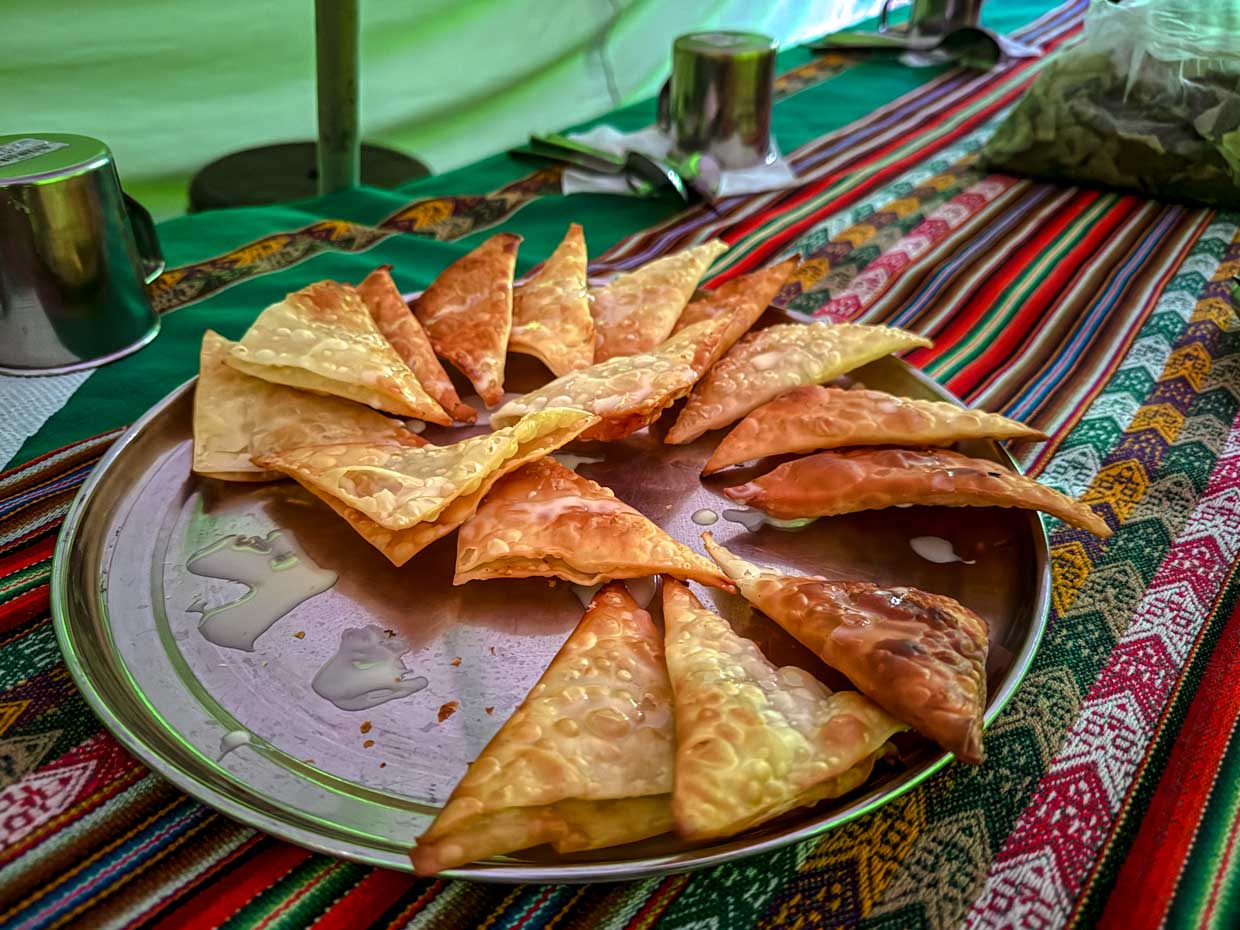 dinner at hobbit house campsite day 2 Alpaca Expeditions Salkantay Trek Cusco Peru - laugh travel eat