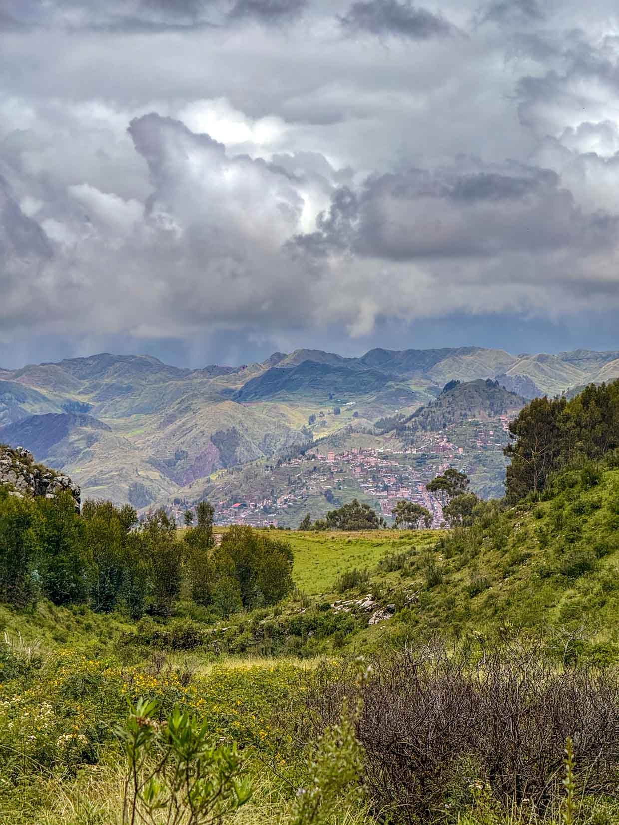 horse riding around ruins in Cusco Peru - laugh travel eat