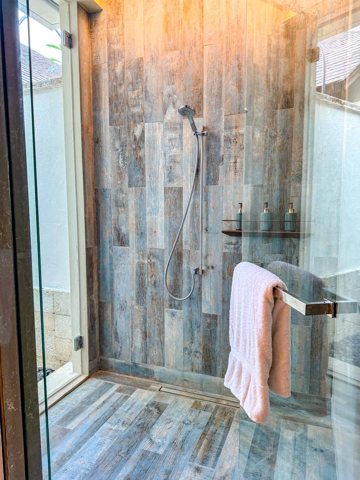 indoor shower bathroom villa Jumeirah Bali Indonesia - laugh travel eat