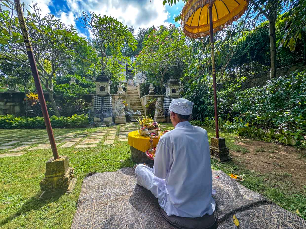water blessing Jumeirah Bali Indonesia - laugh travel eat