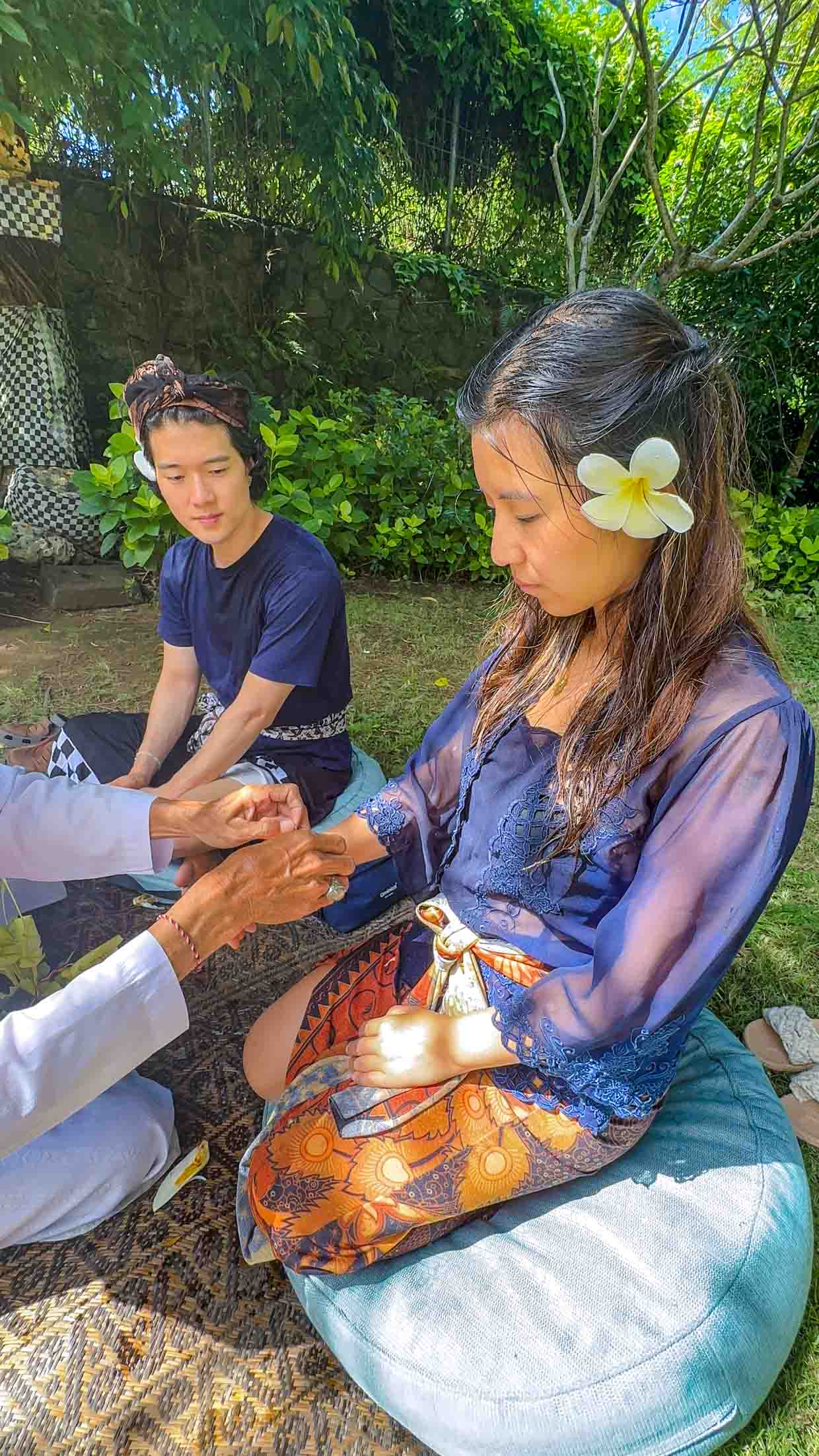 water blessing Jumeirah Bali Indonesia - laugh travel eat