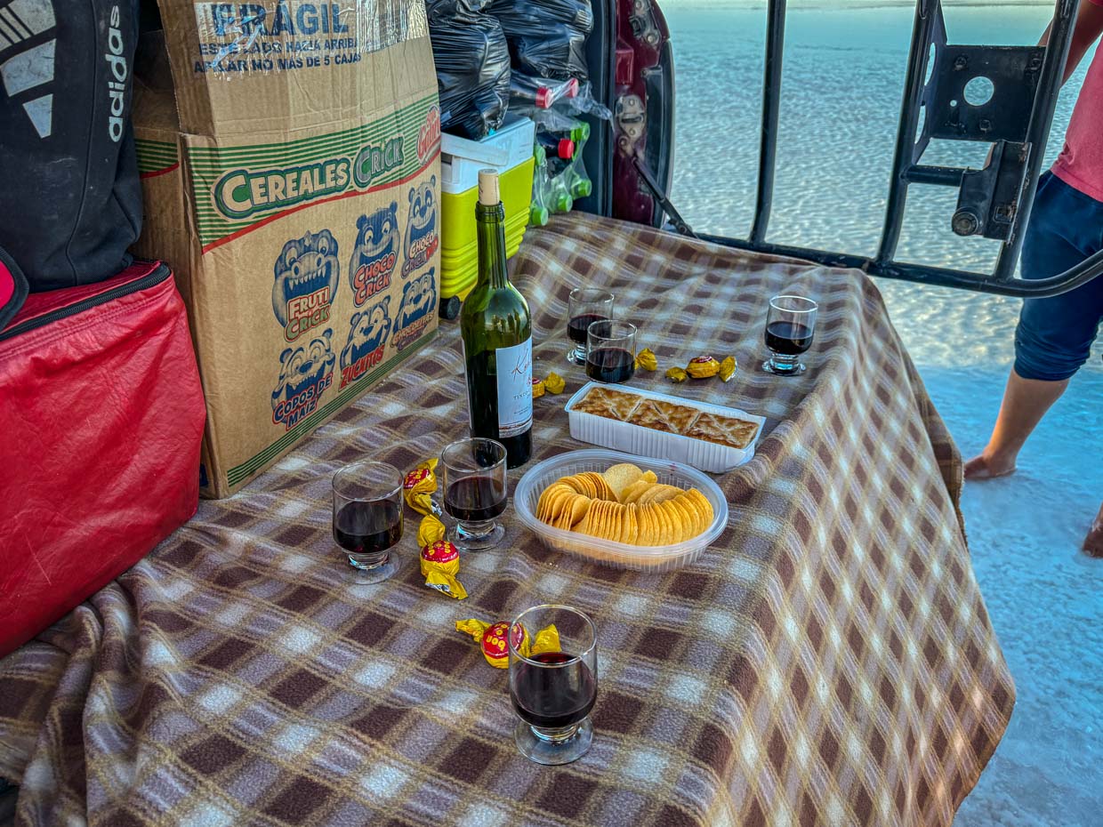 snacks on salt flat day 1 of Uyuni tour Bolivia - laugh travel eat