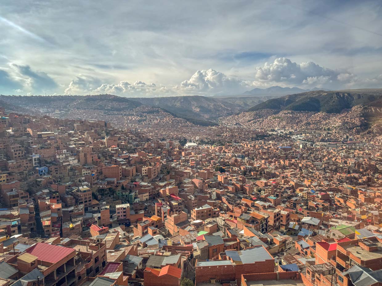 views from Teleférico cable car Bolivian popular food La Paz Bolivia - laugh travel eat