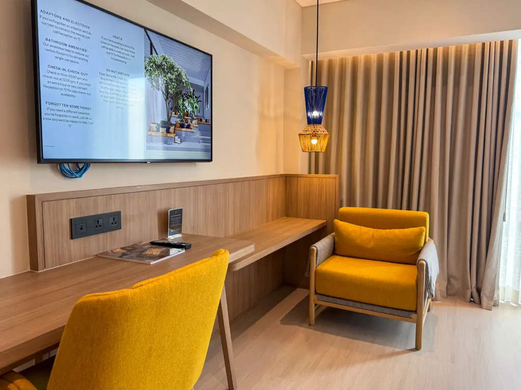 TV and workspace voco Bali seminyak bali _ laugh travel eat